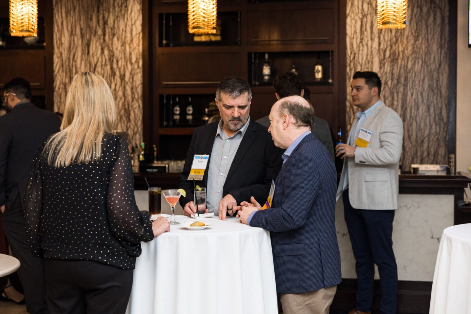 Business people networking at a conference.