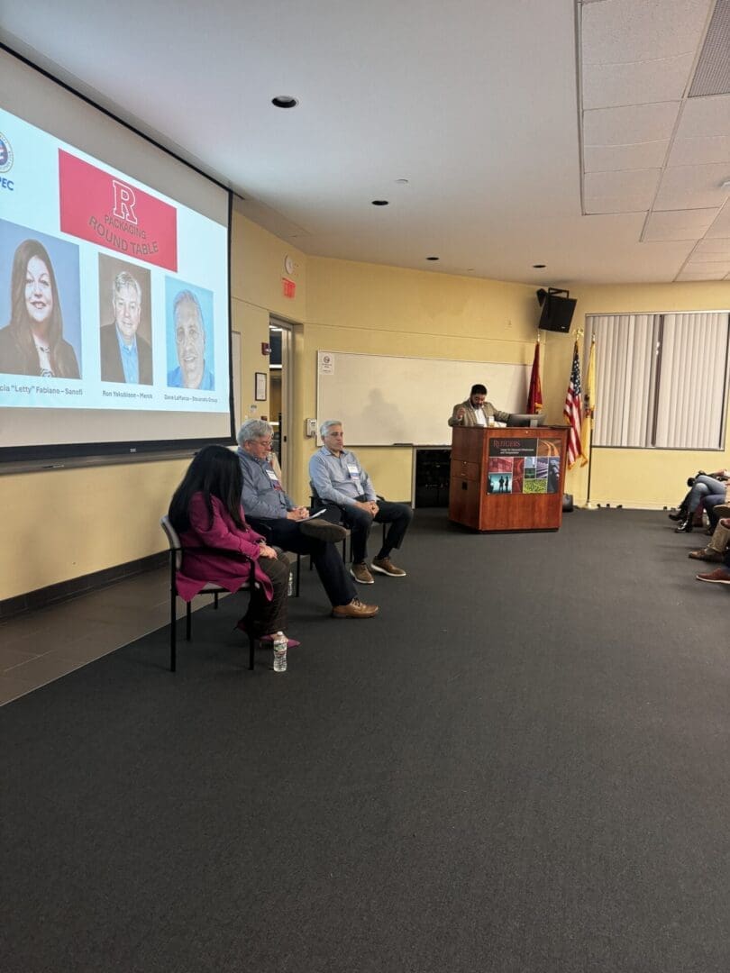 Panel discussion with speakers at event.