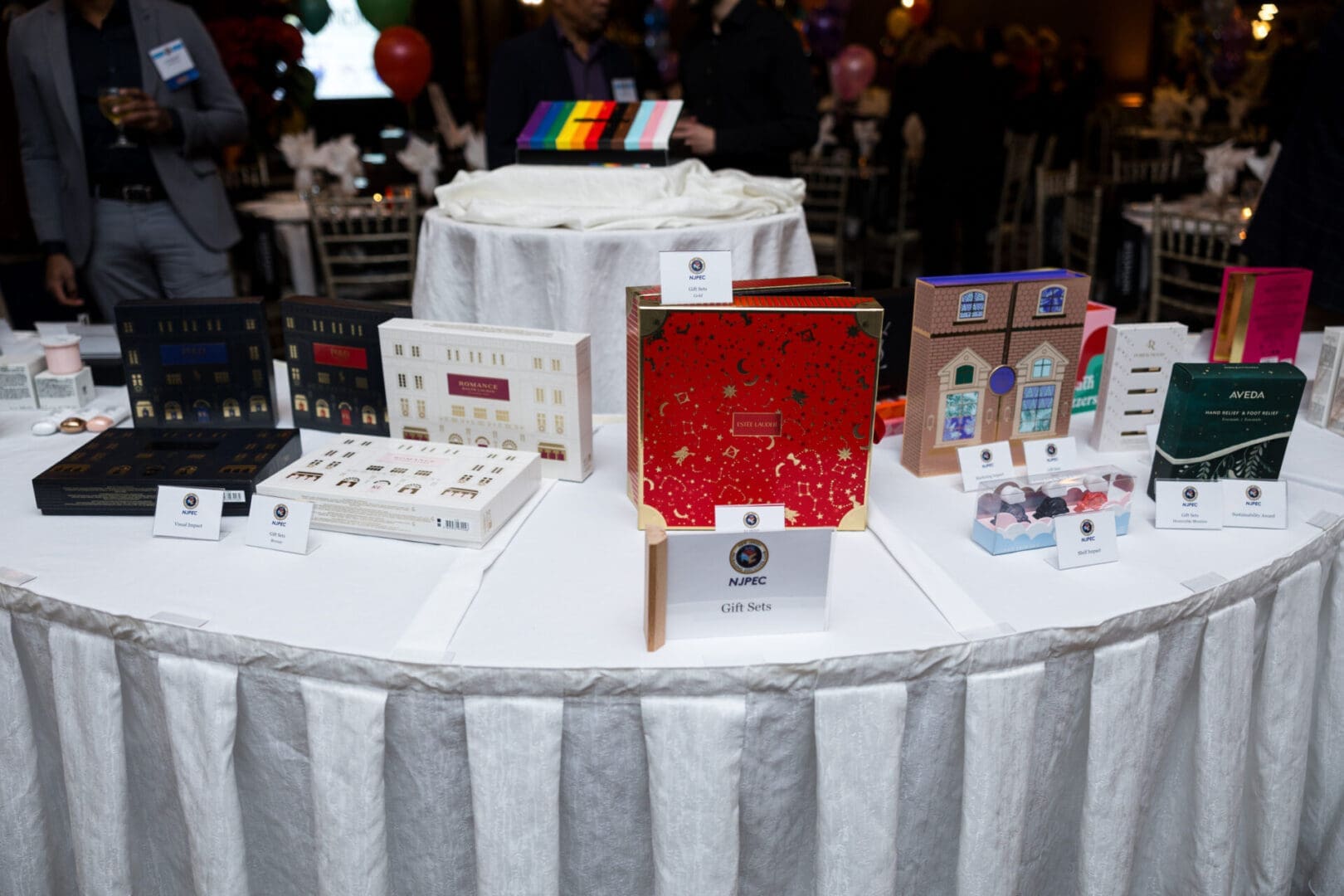 Display of colorful gift sets on table.