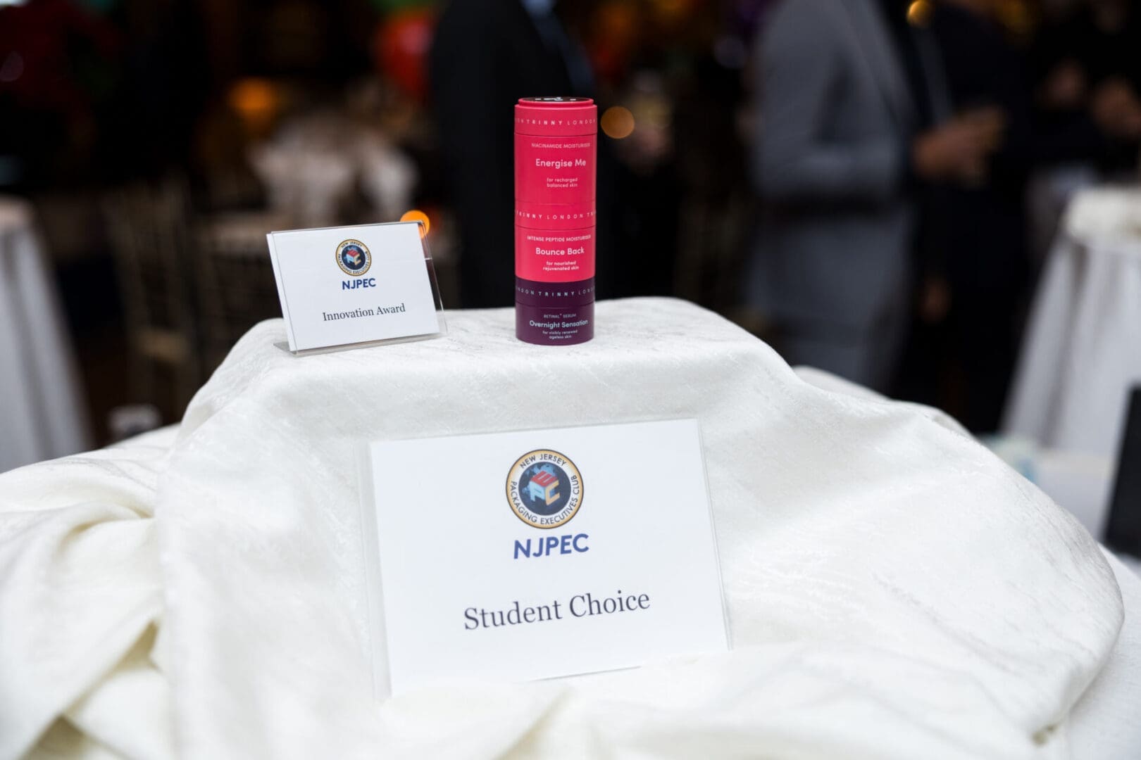 Award presentations on a table setting.