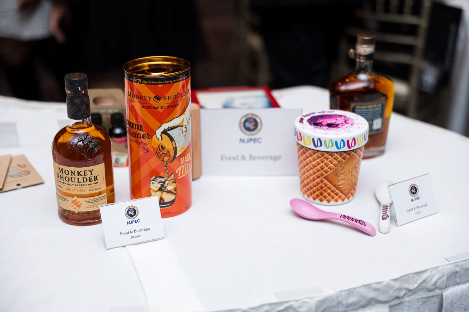 Bottles and ice cream at a tasting event.