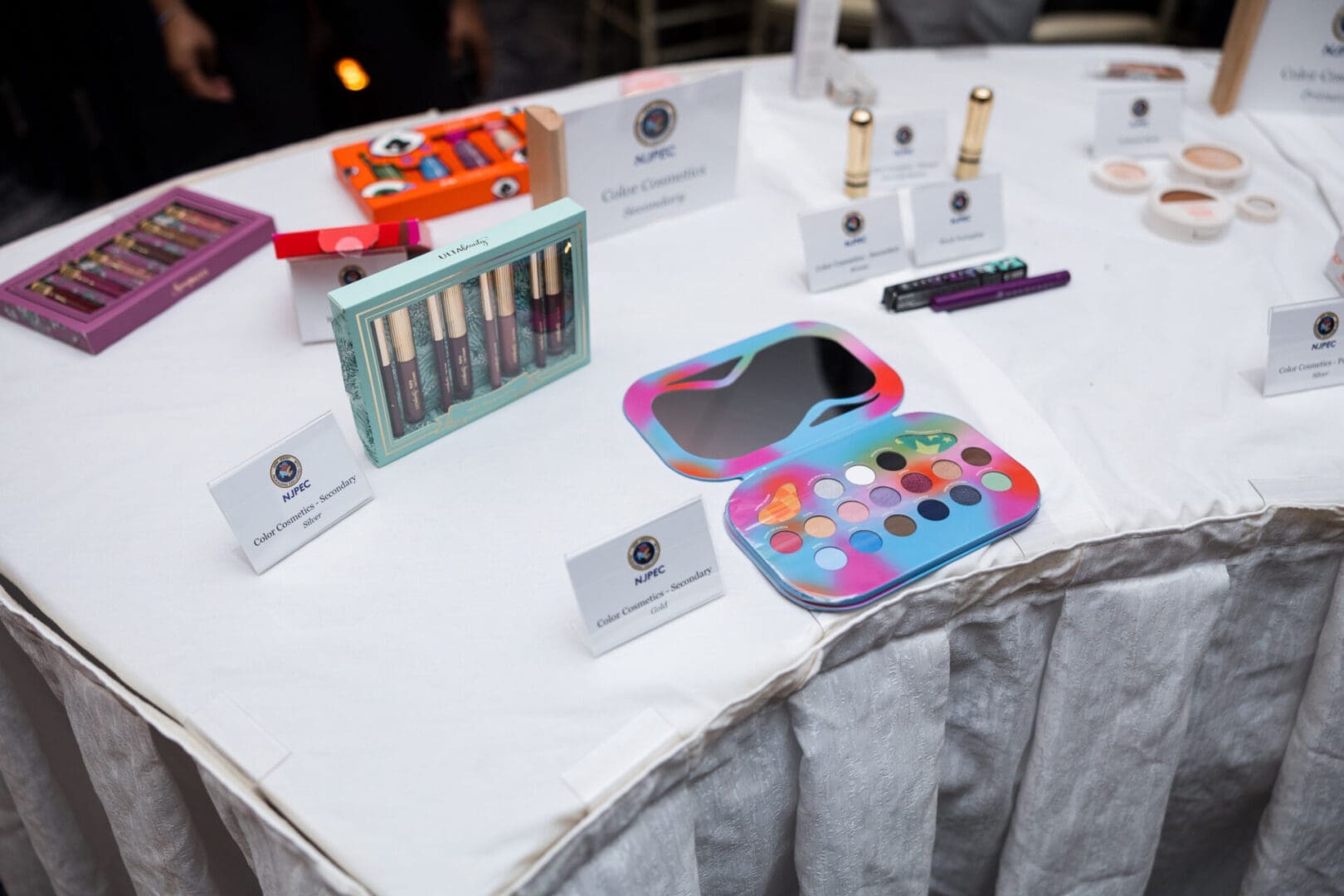 Cosmetic products displayed on a table.