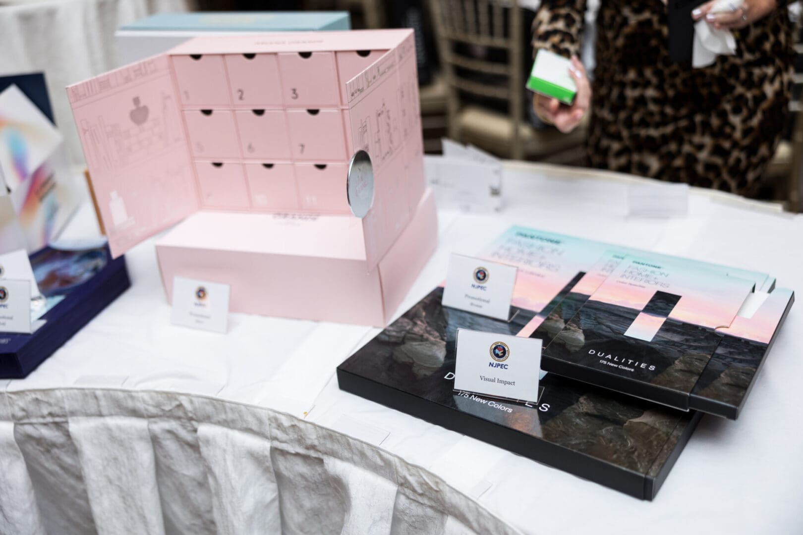 Display of decorative boxes and informational cards.