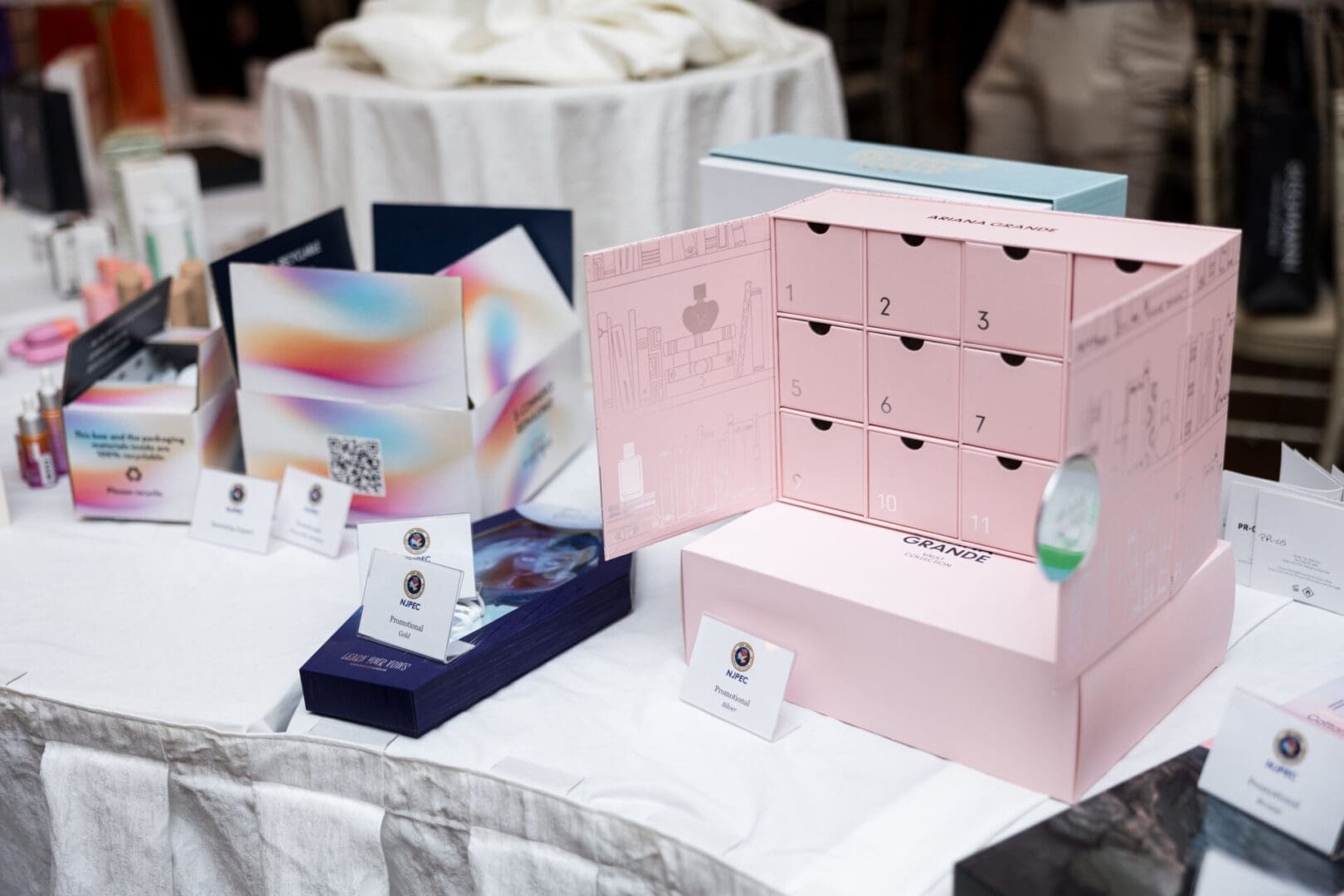 Colorful product boxes displayed on a table.