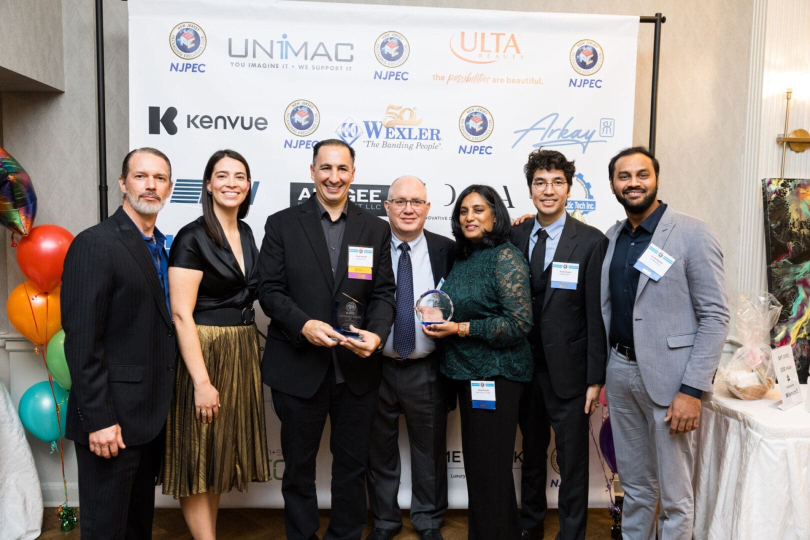 Group photo at an awards ceremony.