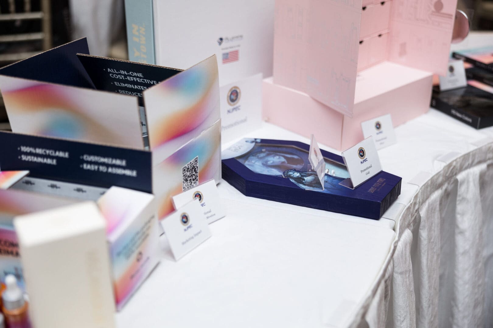 Product displays on a table at an event.