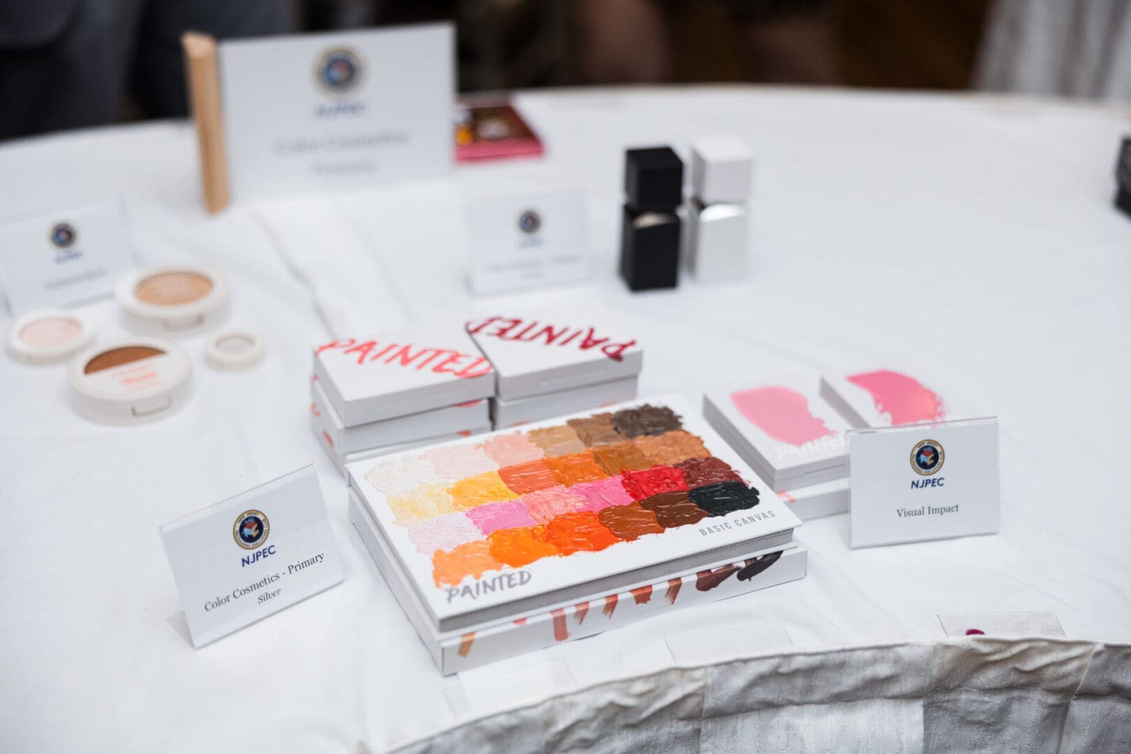 Makeup products displayed on a table.